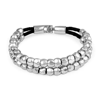 Pulsera de piel natural de borrego trenzada, con broche y cuentas geométricas en baño de rodio - Joyería y bisutería fina