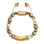 Pulsera ajustable con hilo de seda, piedras de 8mm, con detalle tubular barroco, lunetas e insignia en baño de oro de 22K - Joyería y bisutería fina