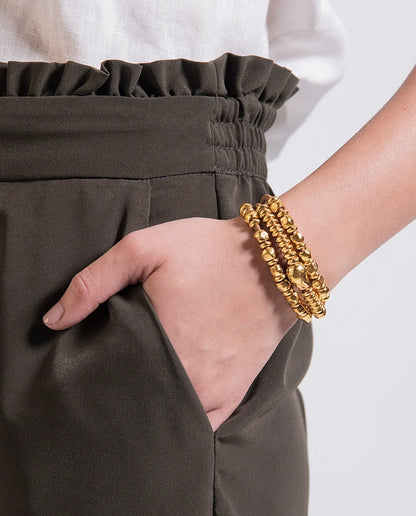 Pulsera de piel con donas y cuentas en baño de oro 22K - Joyería y bisutería fina
