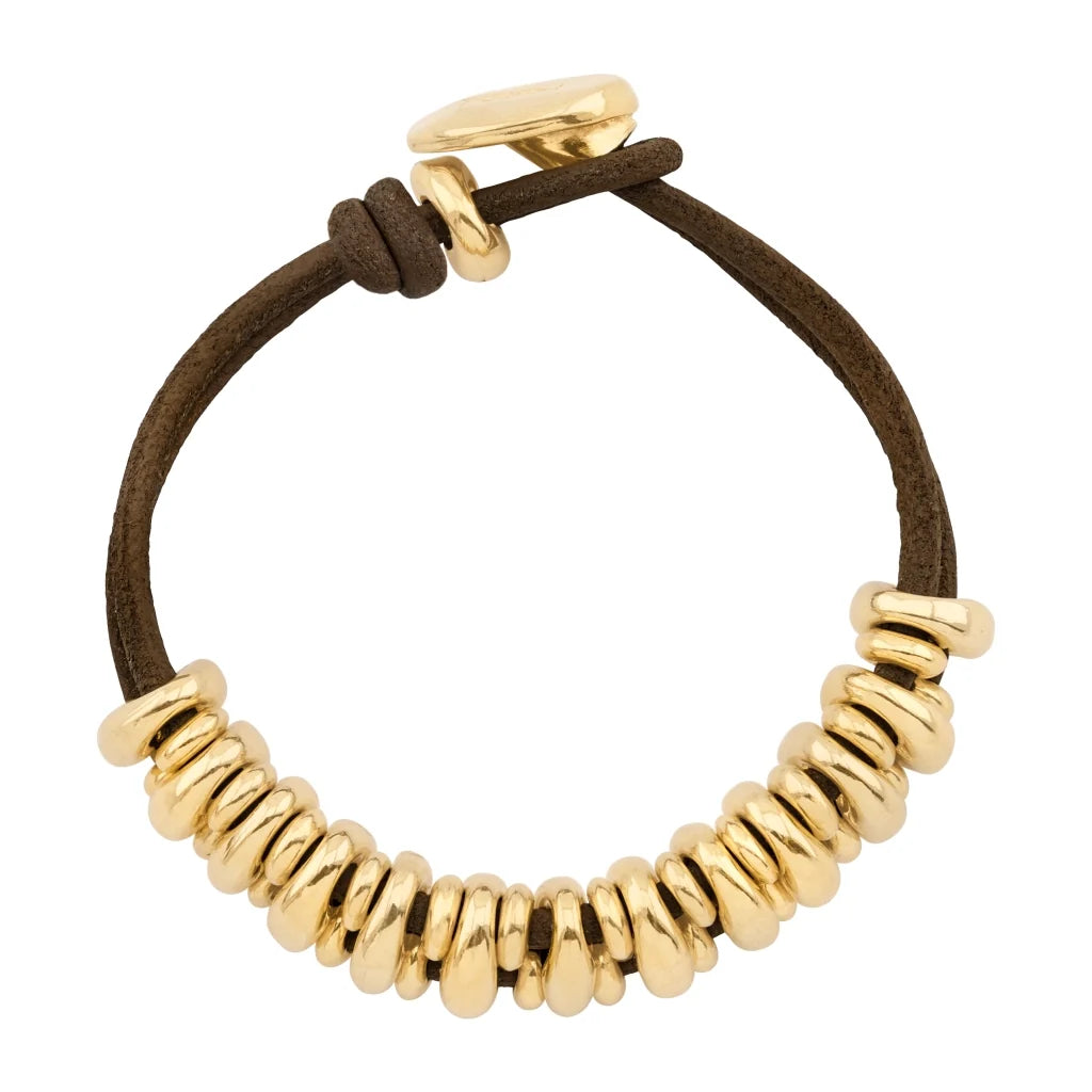Pulsera de piel natural española, con detalles y broche de botón en baño de oro 22K - Joyería y bisutería fina