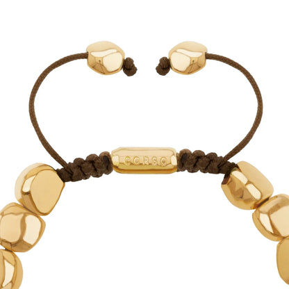 Pulsera con lunetas inspiradas en la forma de piedras del mar, con placa insignia corso en baño de oro 22K, con hilo de seda ajustable - Joyería y bisutería fina