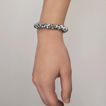 Pulsera de piel natural española, con broche de botón y semillas en baño de rodio - Joyería y bisutería fina