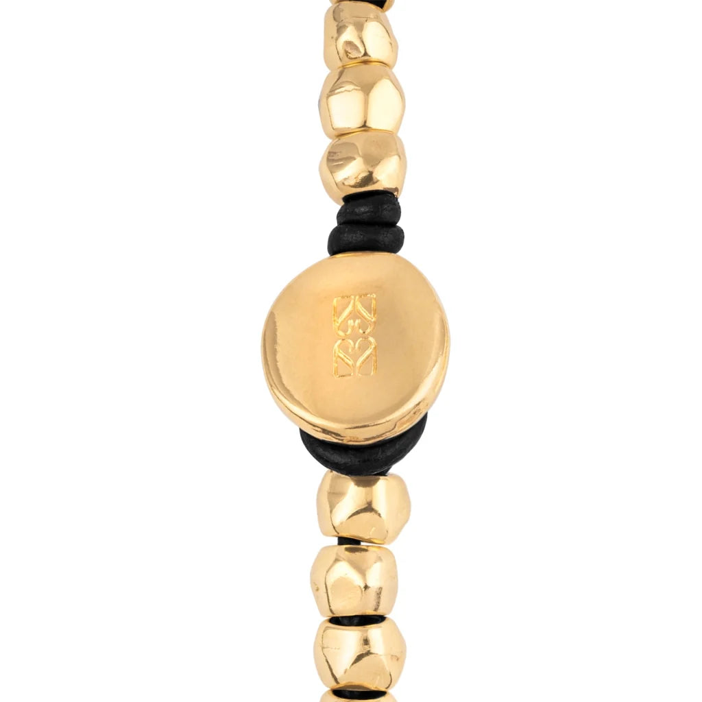 Pulsera de Piel española con cuentas geométricas, elemento tubular y broche de botón en baño de oro 22K- Joyería y bisutería fina