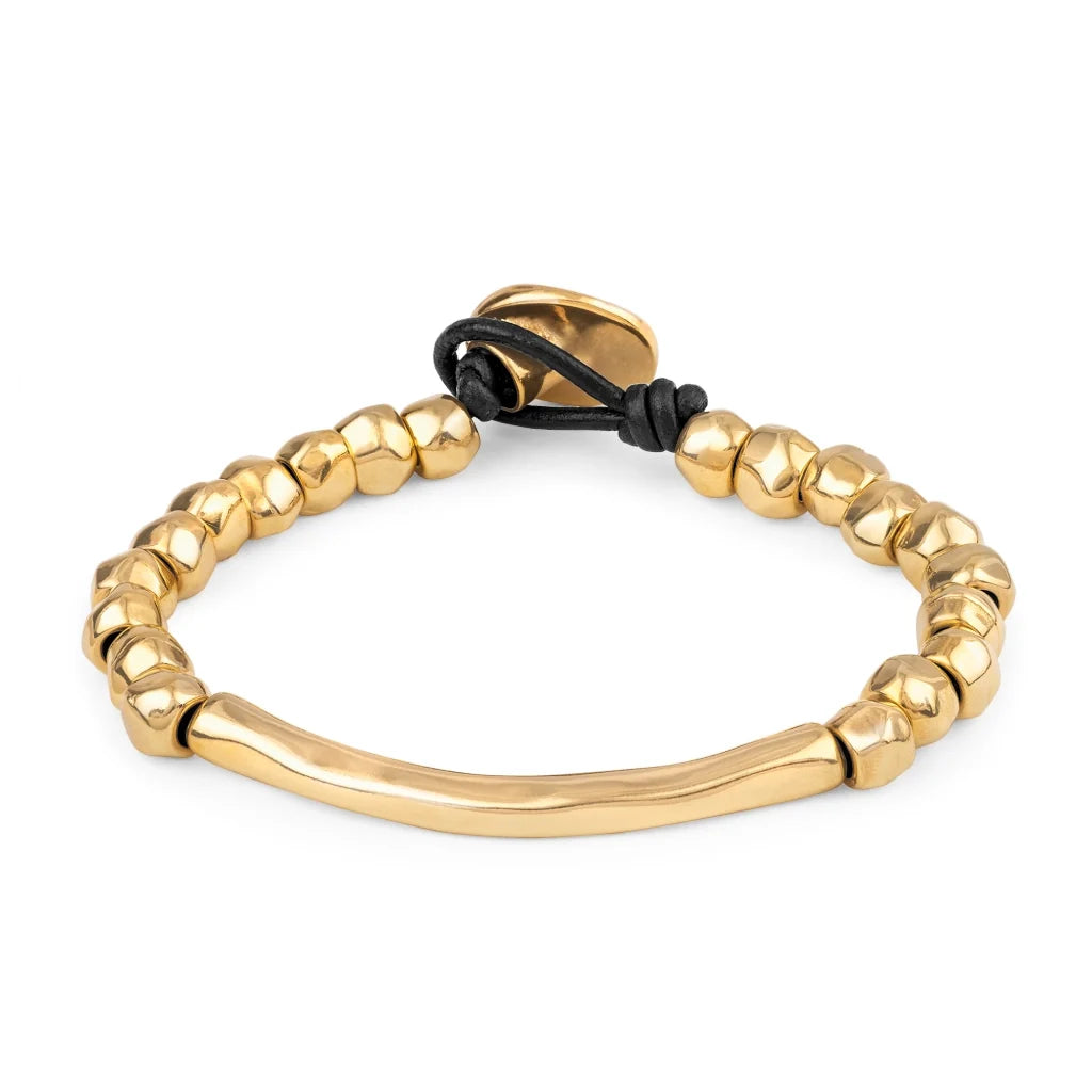 Pulsera de Piel española con cuentas geométricas, elemento tubular y broche de botón en baño de oro 22K- Joyería y bisutería fina