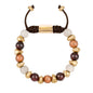 Pulsera ajustable con piedras de 8mm, con semillas y placa con insignia Corso en baño de oro de 22K - Joyería y bisutería fina