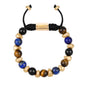 Pulsera ajustable con piedras de 8mm, con semillas y placa con insignia Corso en baño de oro de 22K - Joyería y bisutería fina