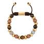 Pulsera ajustable con piedras de 8mm, con semillas y placa con insignia Corso en baño de oro de 22K - Joyería y bisutería fina