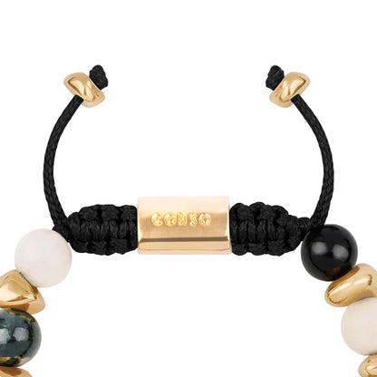 Pulsera ajustable con piedras de 8mm, con semillas y placa con insignia Corso en baño de oro de 22K - Joyería y bisutería fina