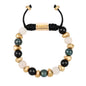 Pulsera ajustable con piedras de 8mm, con semillas y placa con insignia Corso en baño de oro de 22K - Joyería y bisutería fina