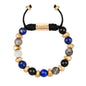 Pulsera ajustable con piedras de 8mm, con semillas y placa con insignia Corso en baño de oro de 22K - Joyería y bisutería fina