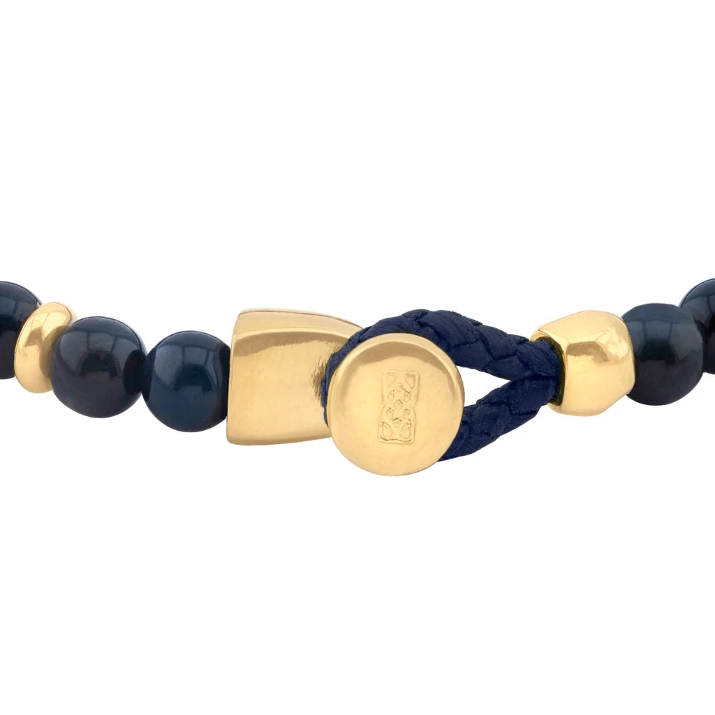 Pulsera con piedra de ojo de tigre de 6mm dispuestas en un suave cordón ajustable de piel de borrego, con conectores y broche de botón bañados en oro de 22K - Joyería y bisutería fina