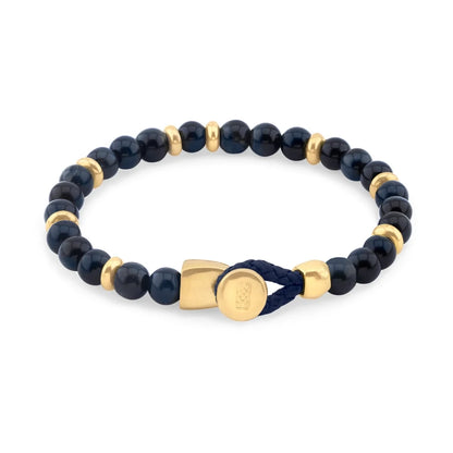 Pulsera con piedra de ojo de tigre de 6mm dispuestas en un suave cordón ajustable de piel de borrego, con conectores y broche de botón bañados en oro de 22K - Joyería y bisutería fina
