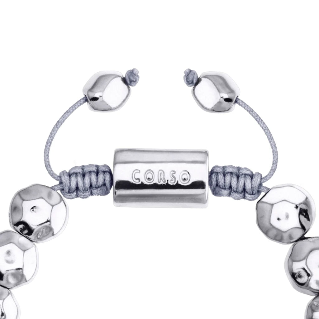 Pulsera ajustable con lunetas facetadas y placa central con insignia bañada de rodio - Joyería y bisutería fina