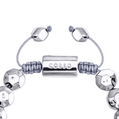 Pulsera ajustable con lunetas facetadas y placa central con insignia bañada de rodio - Joyería y bisutería fina