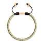 Pulsera con rondeles de piedra de 4mm con mini donas en baño de oro 22K - Joyería y bisutería fina