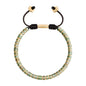 Pulsera con rondeles de piedra de 4mm con mini donas en baño de oro 22K - Joyería y bisutería fina
