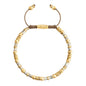 Pulsera ajustable con conchas filipinas de 3mm talladas a mano, intercaladas con cuentas bañadas en oro 22K - Joyería y bisutería fina