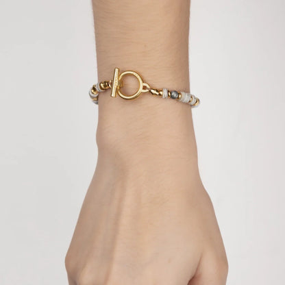 Pulsera en baño de Oro 22K con conchas filipinas talladas a mano y piedras semipreciosas - Joyería y bisutería fina

