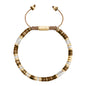 Pulsera en baño de Oro 22K, conchas filipinas heishi, cuarzo blanco - Joyería y bisutería fina