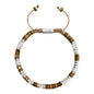 Pulsera en baño de Rodio, conchas filipinas heishi, cuarzo blanco - Joyería y bisutería fina