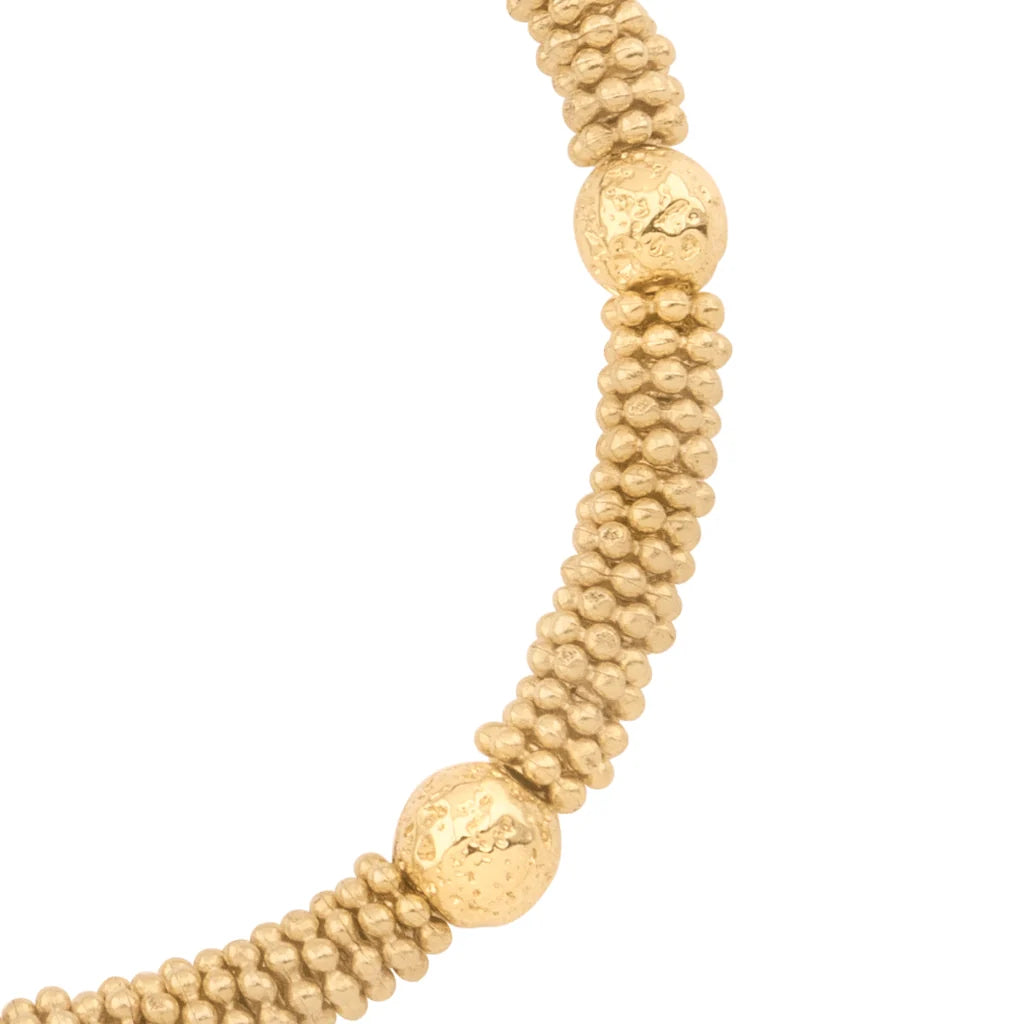 Pulsera con mantras, miniflor y placa octagonal en baño de oro 22K - Joyería y bisutería fina