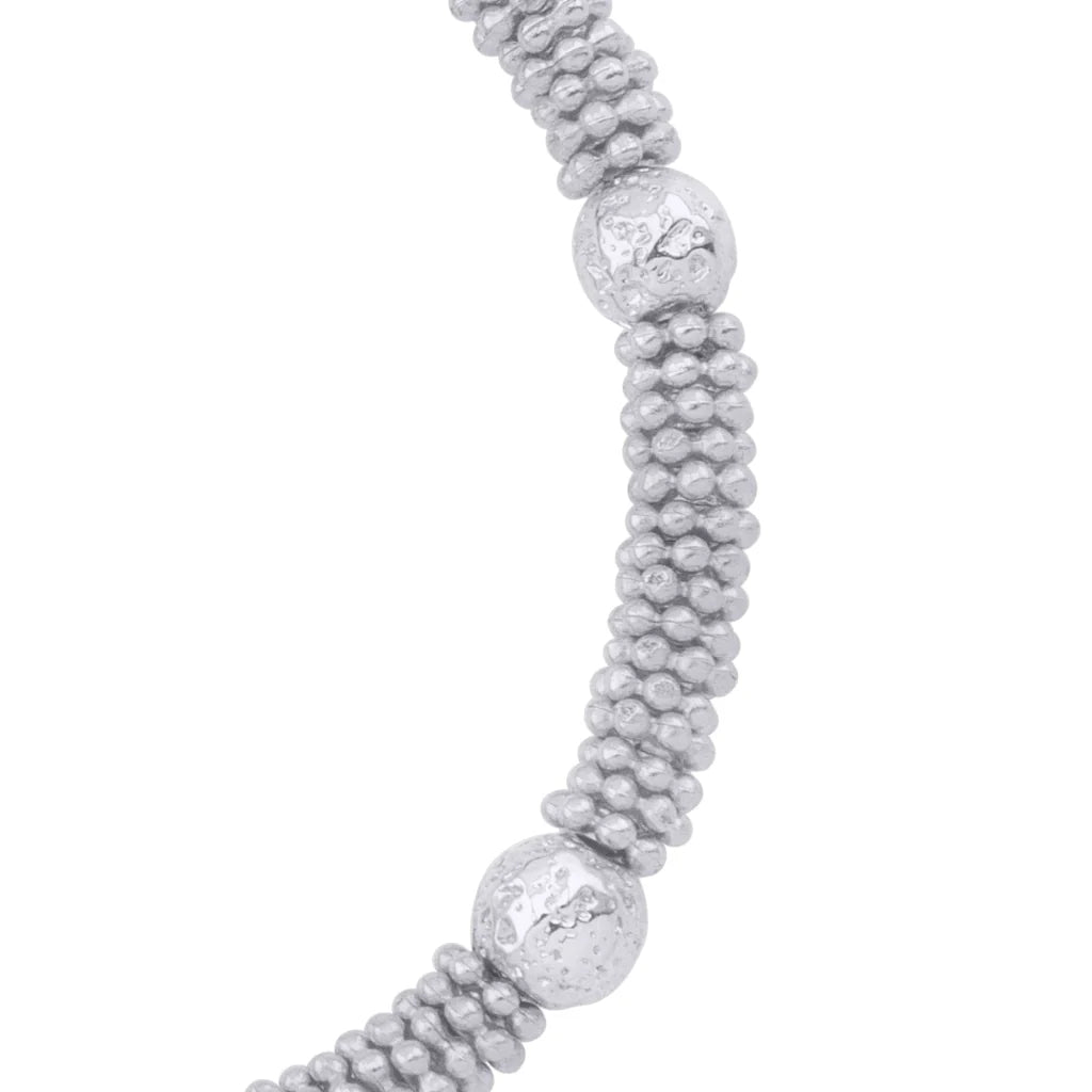 Pulsera con mantras, miniflor y placa octagonal en baño de rodio - Joyería y bisutería fina