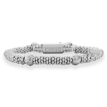 Pulsera con mantras, miniflor y placa octagonal en baño de rodio - Joyería y bisutería fina
